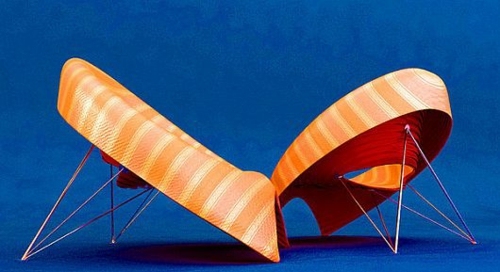 fauteuil design orange cuir cadre metal