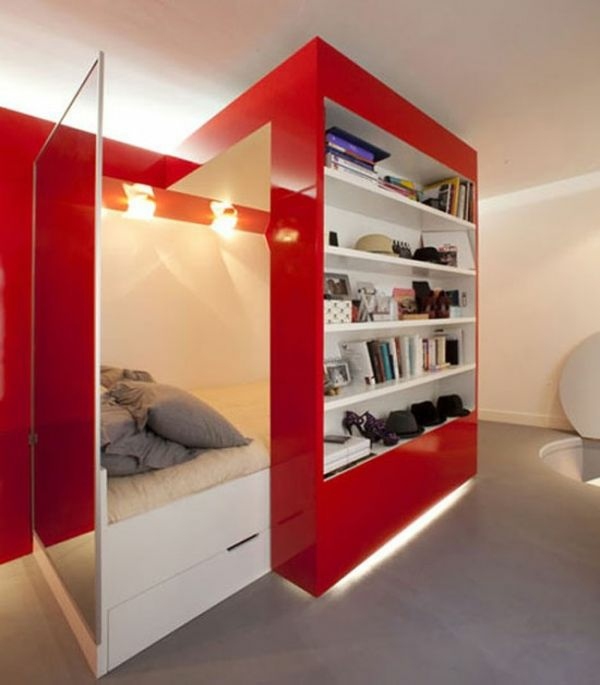 meuble design avec lit cache derriere etageres
