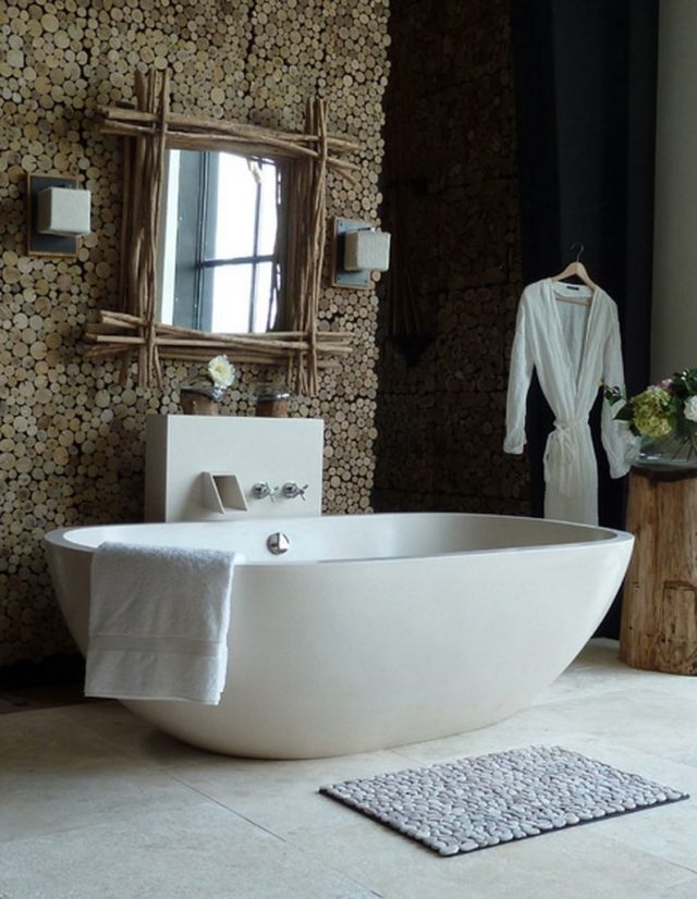 salle-bains-design-naturel-miroir-cadre-branchettes-tapis-bains-pierres